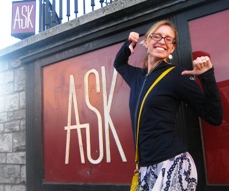This is me in front of a restaurant in Bournemouth, England. My married initials are ASK. (My professional and maiden initials are ASJ.)
