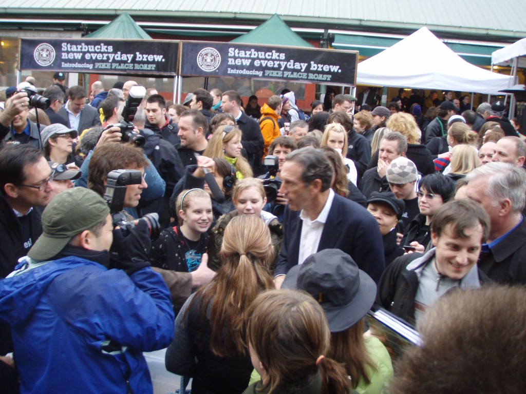 This is me in the crowd at Pike Place Market in 2008, on the day that Starbucks introduced its Pike Place Roast. CEO Howard Schultz is signing autographs in the foreground.